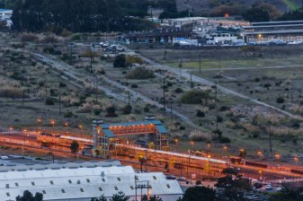 In the middle of a housing crisis, the land adjacent to a Caltrain station sits empty largely thanks to local opposition to development. Image: Wikimedia Commons.