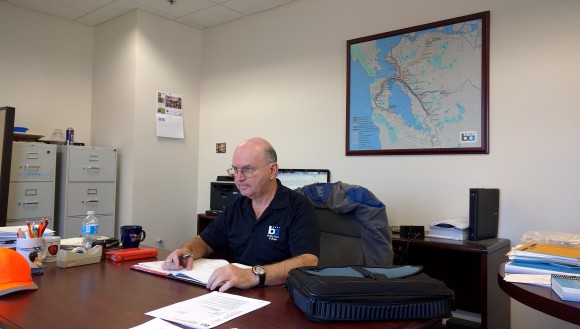 Henry Kolesar, BARTs Group Manager, Vehicle Maintenance Engineer, at his desk at the Hayward shops.