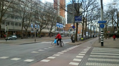 In Rotterdam, transit gets its own lanes, then cars, then bikes, with a median to keep them safe. Photo: Streetsblog/Rudick