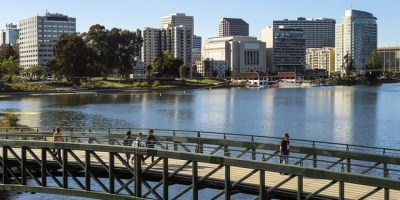 A shot from a few years ago of Lake Merritt. Cherished open space in Oakland is unfortunately too limited for people to properly socially distance, so the city is creating "slow streets" that will restrict thru traffic. Photo: Streetsblog