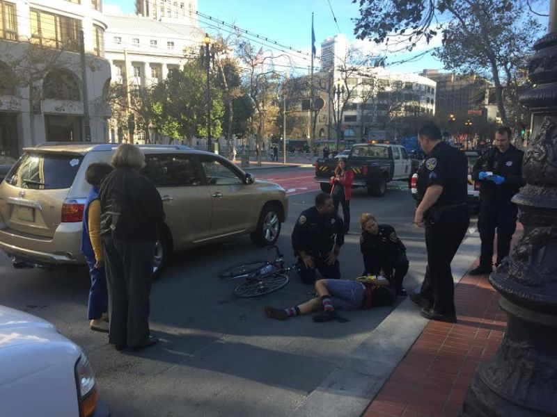 A crash on Market Street, 2016. Private cars are now banned, but taxis, city vehicles, scofflaw motorists who drive down Market anyway, and delivery trucks will continue to put cyclists lives in danger if the city follows through on its "Bummer Market Street" plan. Photo: John Rogers