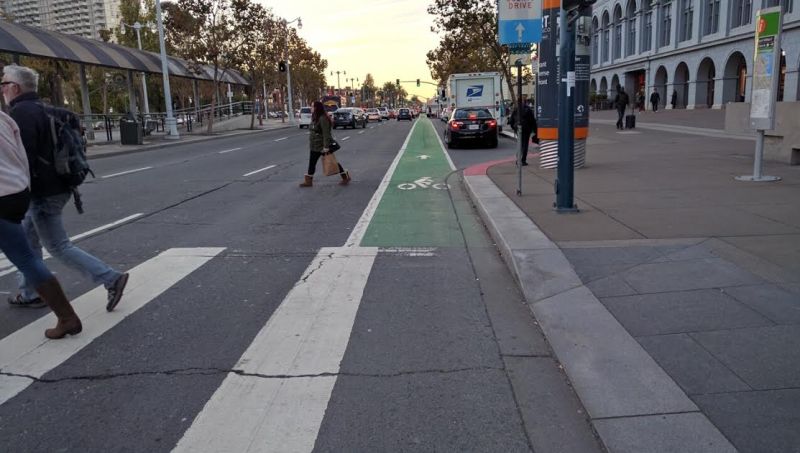 The current green-striped, unprotected lane on Embarcadero. Photo: Streetsblog
