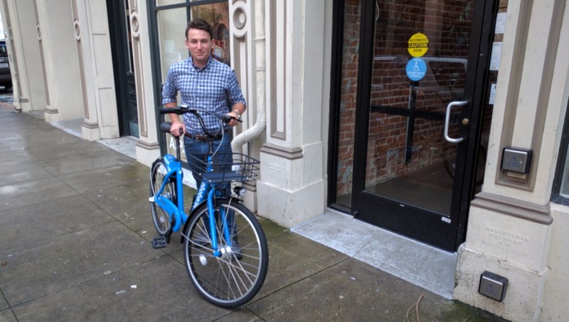 Ilya Movshovich, VP of Operations for Bluegogo, US, outside their shared office space in Jackson Square. Photo: Streetsblog