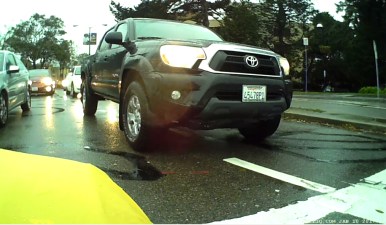 A still from test video from the Fly6...unfortunately, about half the time it's impossible to read the license plate of a passing car. (Note: this motorist did nothing threatening, although he is out of the lane lines). Photo: Streetsblog/Rudick
