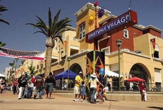 If SB 827 becomes law, we should see more examples of density built around transit, such as Fruitvale BART's transit village seen here. Photo: Eric Fredericks via Flickr