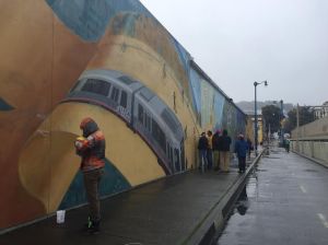 Volunteers cleaned up the Duboce bike mural on Saturday. Photo: SFBC/Melyssa Mendoza
