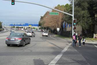 Before: Walking across Highway 101 in East Palo Alto requires crossing wide six-lane intersections, and using a narrow sidewalk on University Avenue’s north side (far left). Photo: Andrew Boone