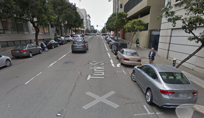 Much of Turk, in its current configuration, has three traffic lanes and two parking lanes. Image: Google Street View