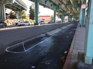 Concrete poured. First layer of striping done on the eastbound 13th street bike lane. Photo courtesy of SFBC.