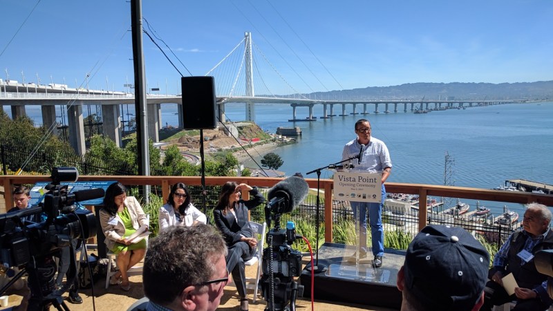 Rene Rivera, Executive Director of Bike East Bay, at the podium before the ribbon cutting for Yerba Buena Island Vista Point. Photo: Streetsblog/Rudick