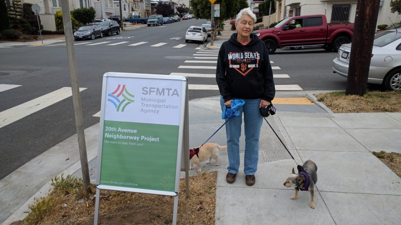 Liz Rogers, with her two dogs, told SFMTA she wants better stop signs and stop sign enforcement. Photo: Streetsblog/Rudick