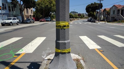 Some police tape and some surgical gloves were all that marked where a man was hit fatally yesterday. Photo: Streetsblog/Rudick