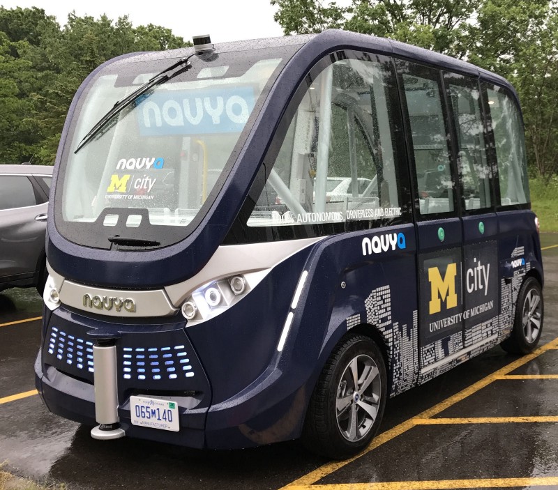 Shared autonomous vehicles like Navya’s people mover (shown at the University of Michigan, where it is under testing) are likely to be more city-compatible than those designed for private personal use (Nelson\Nygaard photo)