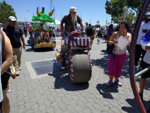 A view of the parade of outrageous bikes at Pedalfest. (In the back is one of the amphibious bikes.) Photo Streetsblog/Rudick