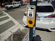 A beg button in San Francisco. More are popping up in Oakland. Photo: Streetsblog