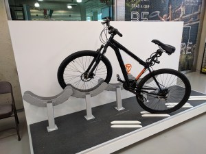 The 'hybrid option" could include one row of these angled bike racks that allow cyclists to remove and load bikes without leaning bikes on top of one another. All photos Streetsblog/Rudick unless otherwise indicated