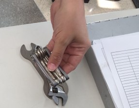 "You can't bring these tools into the building" - the sheriff holding my bike tools. All photos by Joe Linton/Streetsblog L.A.