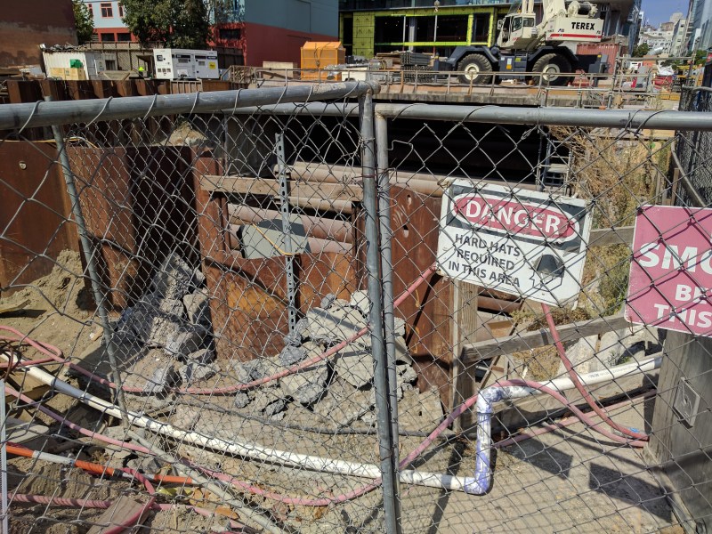 The Central Subway subway construction near Yerba Buena. The project is years behind schedule--and nobody should be surprised about that, given management blunders, says guest commentator Gerald Cauthen. Photo: Streetsblog/Rudick
