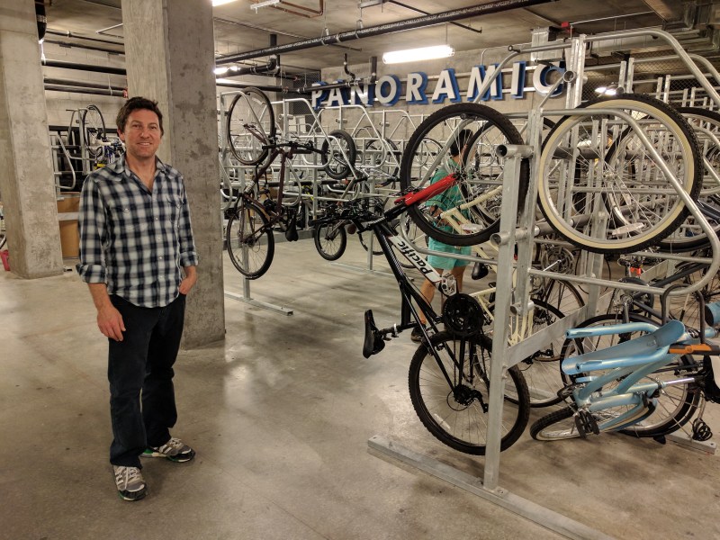 Peter Lemieux, who handles SF sales for Dero, a company that builds bike racks. next to an installation in SF. Photo: Streetsblog/Rudick