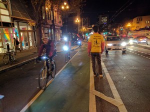 More than 70 people stood on the bike lane on Upper Market to demand SFMTA start installing parking protected bike lanes.  All photos Streetsblog/Rudick