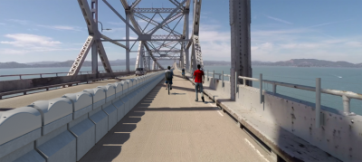 A rendering of the bridge bike and ped path. This will soon be changed into another car lane if pro-car politicians in Marin and elsewhere have their way. Image: MTC/HTNB