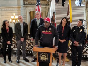 Walk SF's Cathy DeLuca, SFBC's Brian Wiedenmeier,  Supervisor Jeff Sheehy, Families for Safe Street's Alvin Lester, Acting Mayor London Breed, and  Police Chief Bill Scott, at this morning's event at City Hall to discuss progress towards Vision Zero. Photo: Streetsblog/Rudick