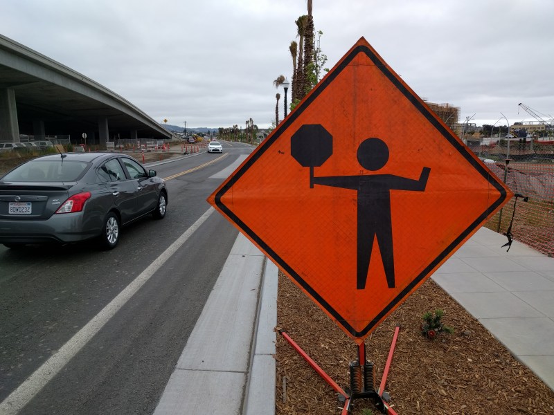 Even on this brand new street in Oakland, the city is constructing a dangerous, unprotected gutter-pan bike lane. Photo: Streetsblog/Rudick