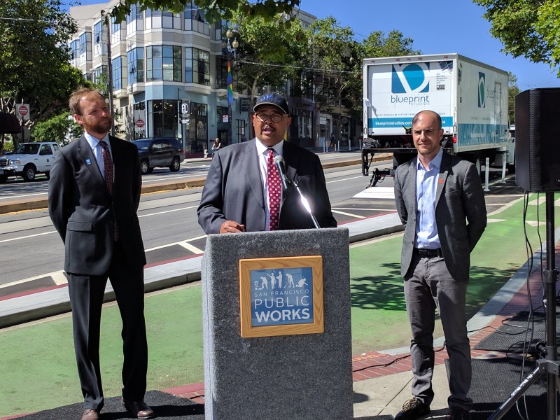 Tom McGuire, Mohammed Nuru, and Brian Wiedenmeier at an event to introduce the city's then-new 'Vision Zero' sweepers. Photo: Streetsblog/Rudick