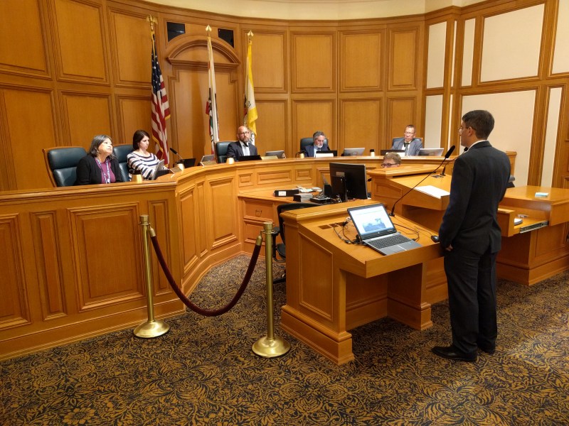 SFMTA's Ricardo Olea addresses the Public Safety and Neighborhood Services Committee about work to protect seniors. Photo: Streetsblog/Rudick