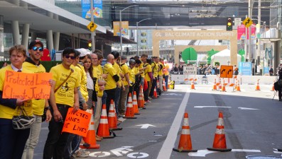 Some 45 "people protected bike lane" protesters outside the Climate Summit. Photo:  John Entwistle