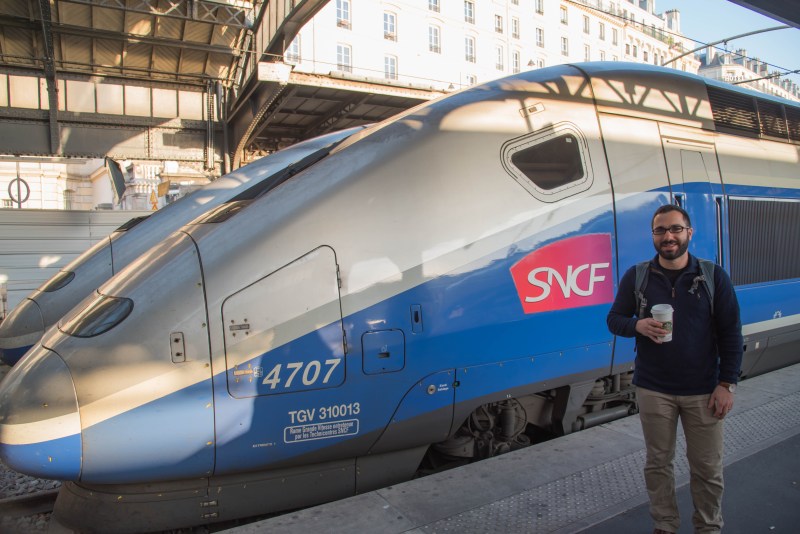 Boris Lipkin in front of a French high-speed train