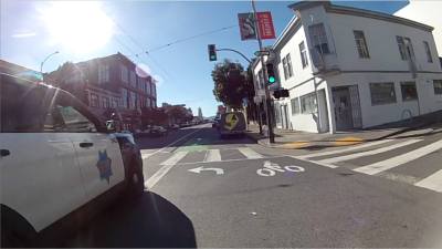 A video capture of a police cruiser, apparently not responding to an emergency, driving in the bike lane. Photo: Ziggy Tomcich