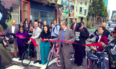 SFBC's Brian Wiedenmeier, outgoing Supervisor Jane Kim, SFMTA's Ed Reiskin, and other officials and advocates at yesterday's ribbon cutting for Howard Street's new protected bike lane. Photo: SFBC