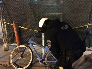 An officer investigating the scene of a hit & run in Fruitvale. Photo: OPD via Twitter