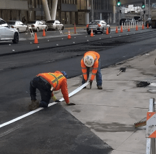 March 25--a paving crew narrowing the bike lane, two blocks from where Tess Rothstein was killed. Photo: Dale Munroe via twitter