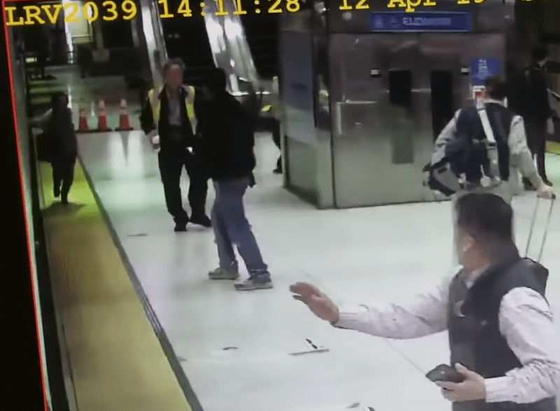 Still from the SFMTA's CCTV of a woman getting dragged by an LRV. The operator apparently made no attempt to stop the train. Image: SFMTA, as obtained by the SF Examiner