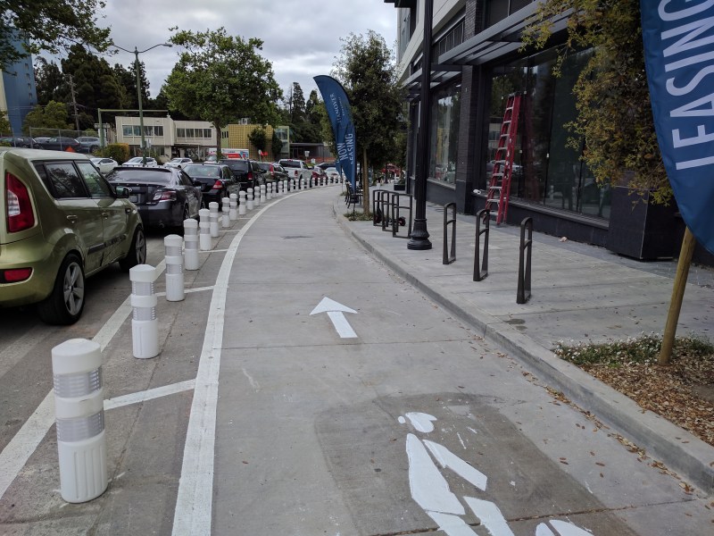 Protected bike infrastructure that resulted from Oakland's new DOT. Streetsblog/Rudick
