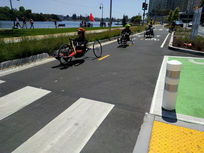 Disabled cyclists enjoy a ride on Oakland's new protected bike lane on Harrison Street along the lake. All pics Streetsblog/Rudick