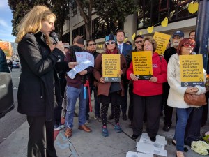 Walk San Francisco's Marta Lindsey reads the names of the dead at Monday night's vigil in the Tenderloin. All pics Streetsblog/Rudick