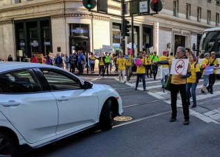 Protesting private cars on Market Street back in May--a major goal of safety advocates that may soon be realized. Photo: Streetsblog/Rudick
