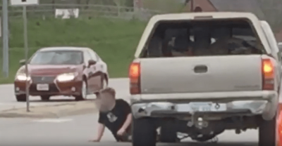 A boy who was struck by a car that backed him and then ran over him again, miraculously walked away. Photo: Crimestoppers.com