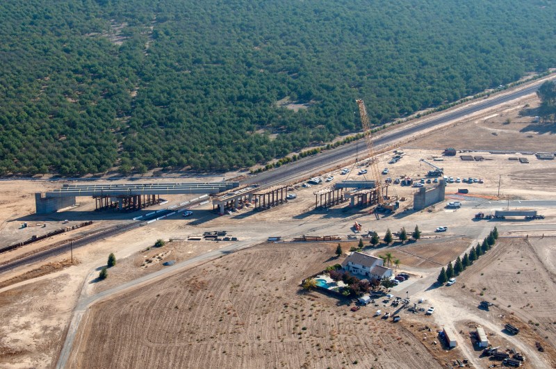 HSR cutting through groves of trees at the Road 27 overcrossing in Madera County. Photo: CAHSRA