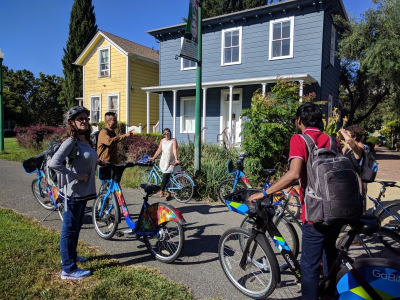 The group of some fifteen advocates, students, and urban planners stop at the back of San Jose's Little Italy. All photos Streetsblog/Rudick unless indicated