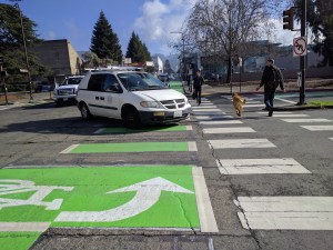 The pedestrians crossing the intersection of Bancroft and Oxford in this photo should be wearing bright clothing, according to Berkeley Police. Photo: Streetsblog/Rudick