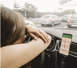 Expectation: car commercial model soaring gleefully through an uncongested downtown. Reality: This. Image via Creative Commons.