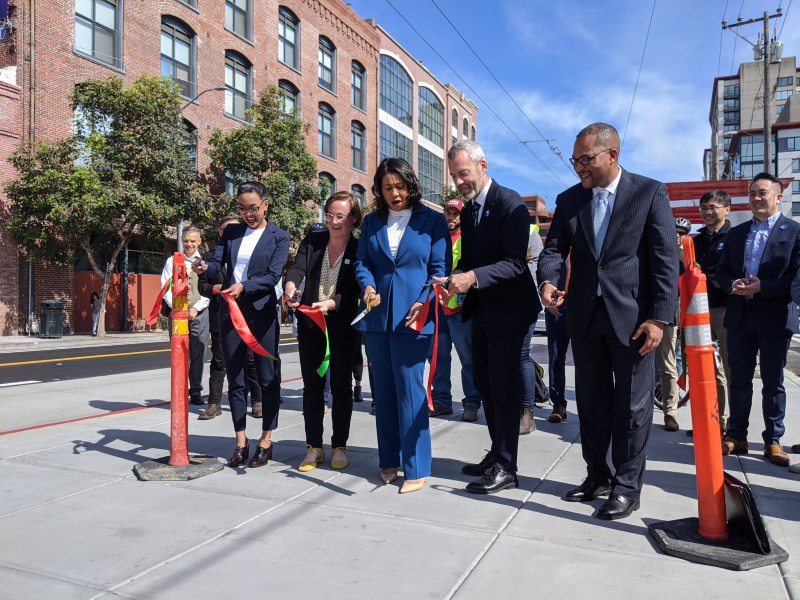 Claire Amable, Jodie Medeiros, London Breed, Jeffrey Tumlin, and Alaric Degrafinried cutting the ribbon. Photo: Streetsblog/Rudick