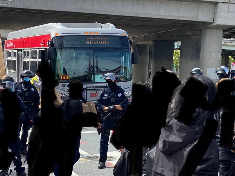 Muni providing an assist to the police over the weekend. Photo: Chris Arvin via twitter