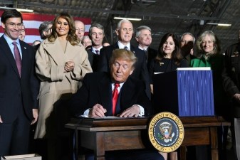 President Donald Trump signs S.1790, the National Defense Authorization Act for Fiscal Year 2020 as senior leaders look on, Friday, Dec. 20, 2019 At Joint Base Andrews. The act authorizes a budget that supports the U.S. armed forces and postures the Air Force to meet the requirements of the National Defense Strategy. (U.S. Air Force photo by Airman 1st Class Spencer Slocum)