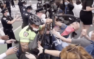 Police used their bicycles as weapons against protestors in New York. Source: Twitter