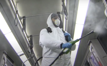 A BART worker sterilizing a train interior. Photo: BART